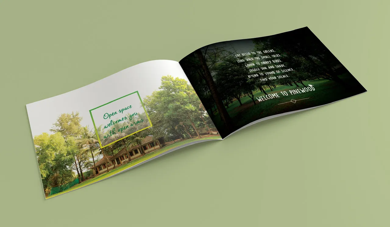 Open brochure spread on sage green: a resort lawn photo beside the line “Open space welcomes you with open arms”.