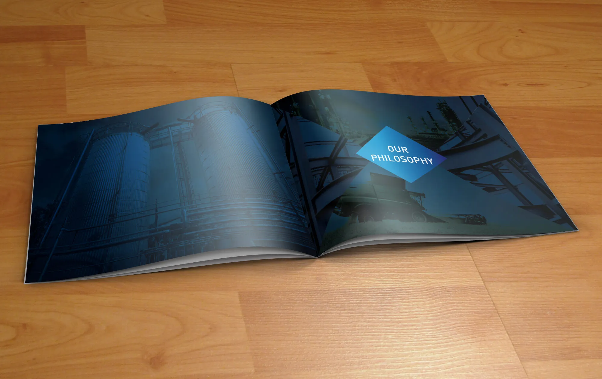 Open corporate brochure in dark navy with industrial photography of storage silos and steel plants.