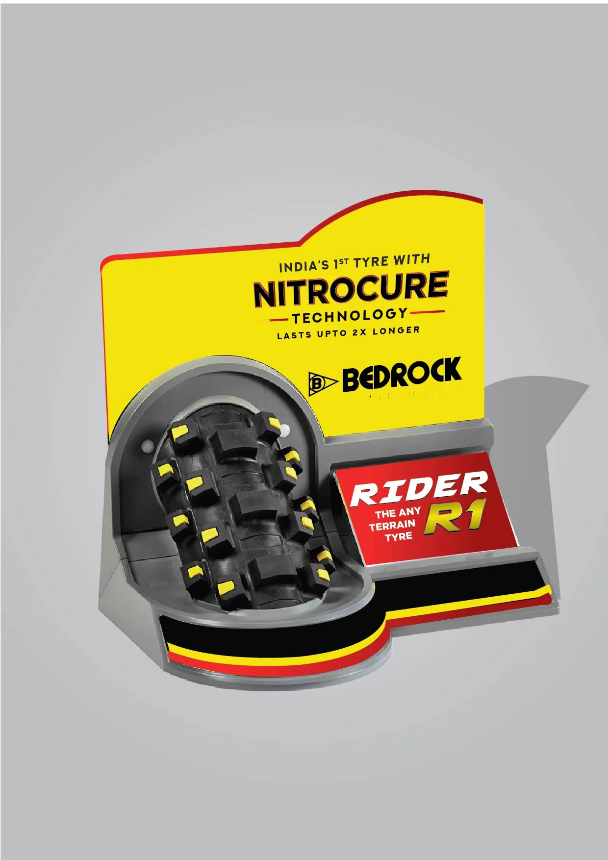 Mockup of a yellow Bedrock point-of-sale counter display holding a tyre section under a Nitrocure Technology header.