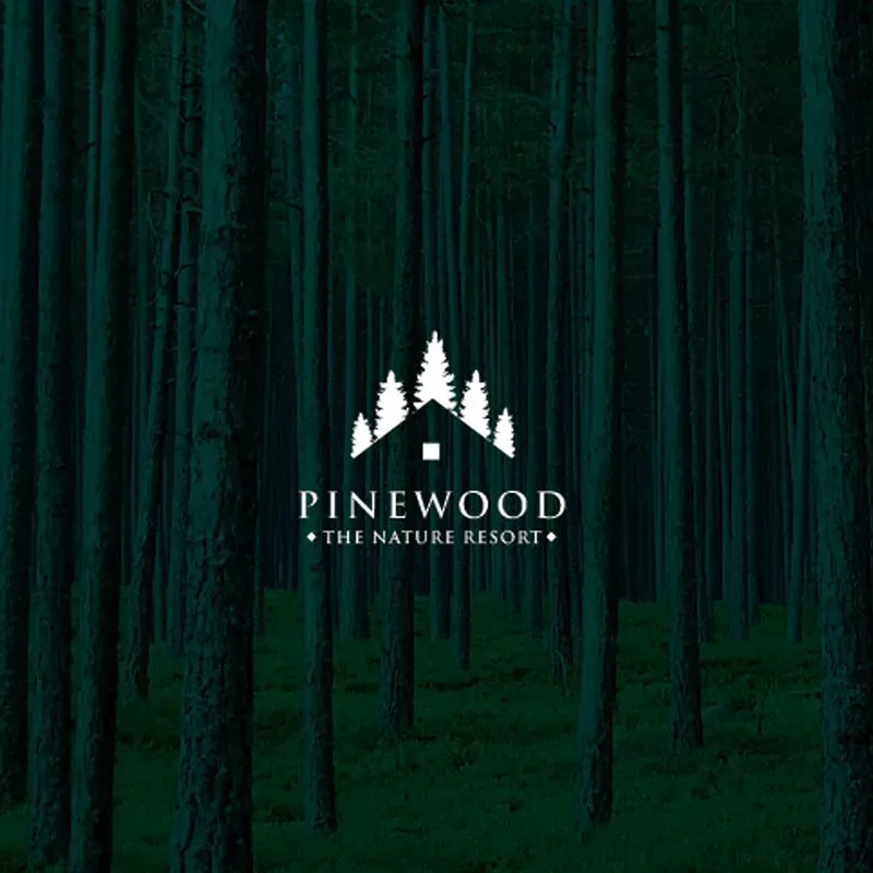 White Pinewood “The Nature Resort” wordmark and pine-trees logo over a dark pine forest.